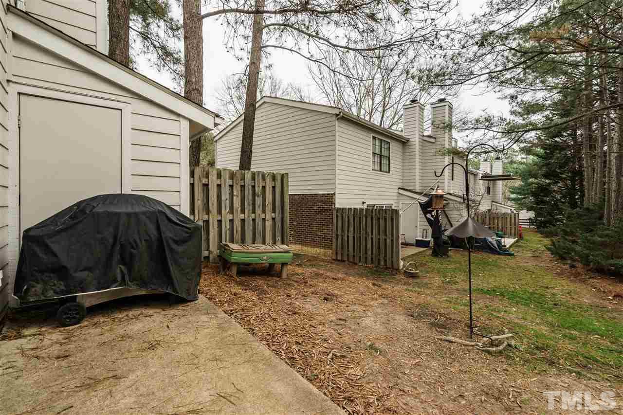 7634 Falcon Rest Circle, Unit 7634 Raleigh, NC 27615 - Photo 22 of 25 a backyard of a house
