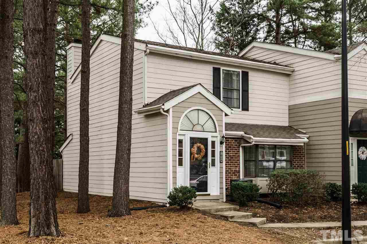7634 Falcon Rest Circle, Unit 7634 Raleigh, NC 27615 - Photo 25 of 25 a front view of a house with garden