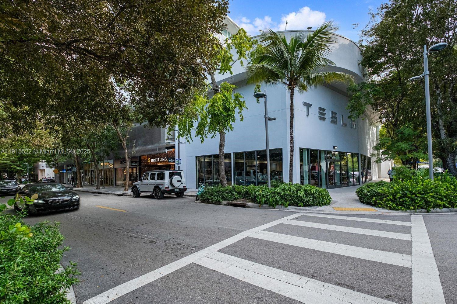 137 Northeast 46th Street Miami, FL 33137 - Photo 11 of 12 a couple of cars parked in front of a building