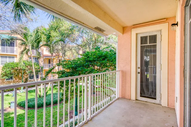 a bathroom with a bathtub shower sink and a mirror