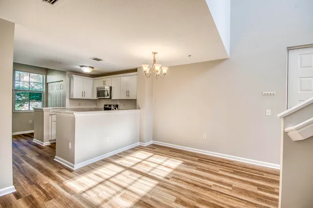 a view of a living room with a window