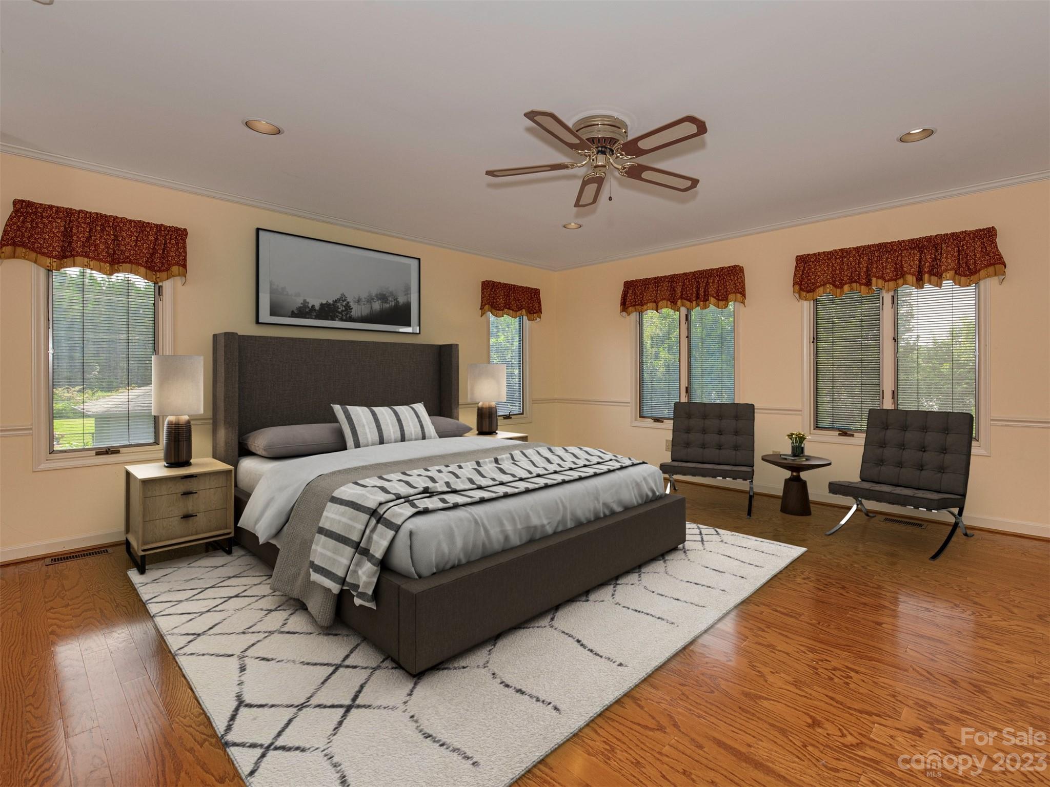 136 Patrick Road Gastonia, NC 28056 - Photo 14 of 22 a spacious bedroom with a bed a couch and a large window