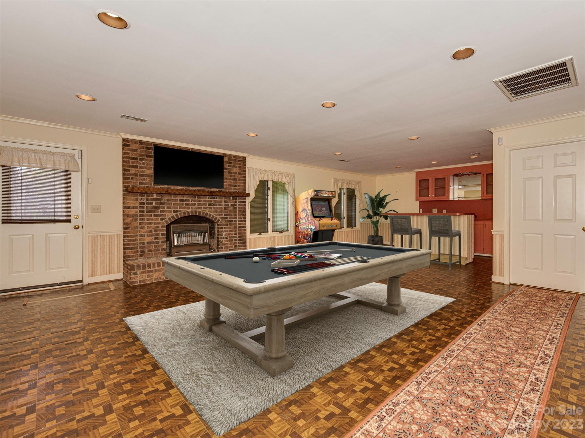 136 Patrick Road Gastonia, NC 28056 - Photo 19 of 22 a living room with furniture a flat screen tv and a fireplace