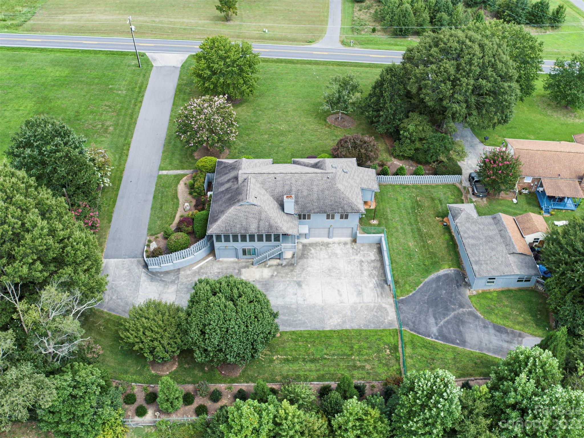 136 Patrick Road Gastonia, NC 28056 - Photo 2 of 22 an aerial view of a house with garden space sitting space