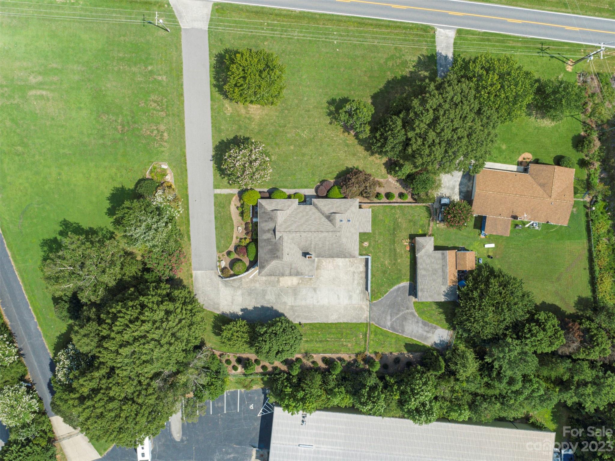 136 Patrick Road Gastonia, NC 28056 - Photo 3 of 22 an aerial view of a house with outdoor space