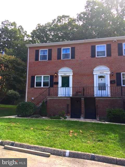 9331 Pan Ridge Road Baltimore, MD 21234 - Photo 1 of 8 a front view of a house with a garden
