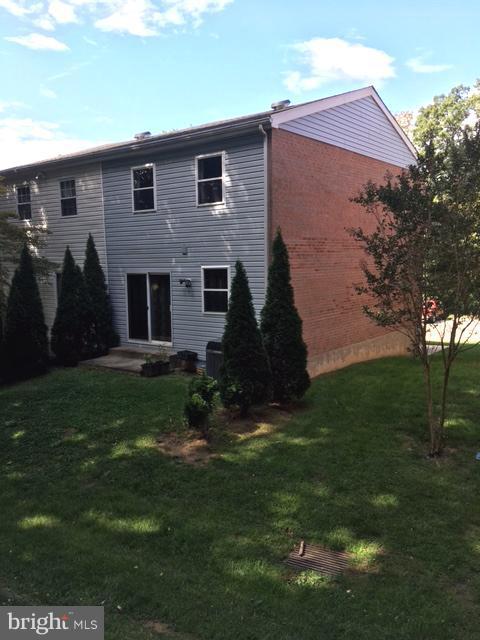 9331 Pan Ridge Road Baltimore, MD 21234 - Photo 2 of 8 a backyard of a house with lots of green space