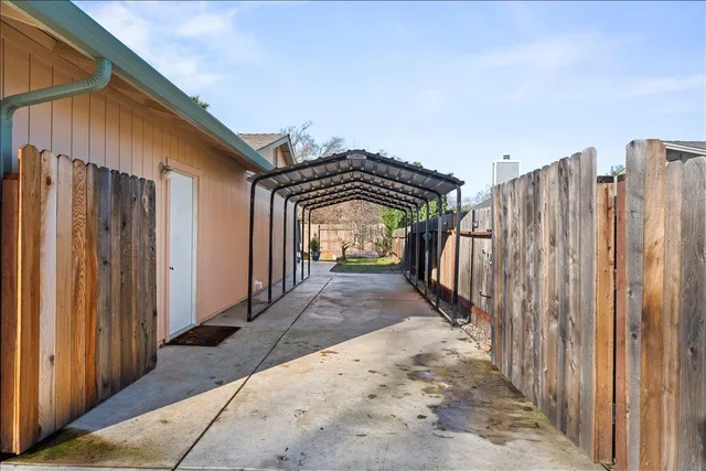 a view of backyard with seating space