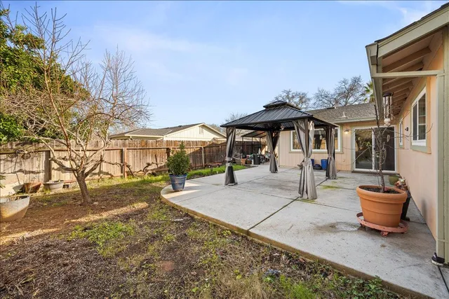 an aerial view of a house with a swimming pool