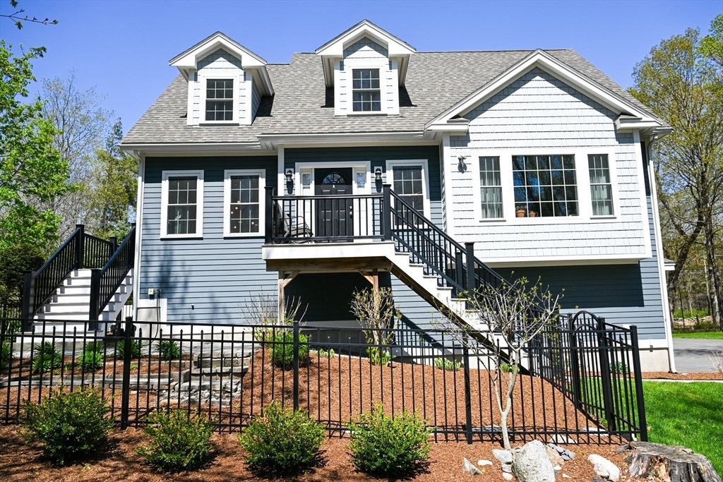a front view of a house with a porch