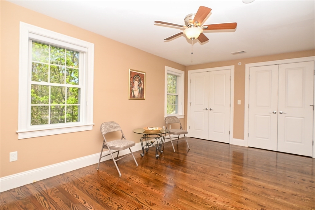 60 Harding Street, Unit C Medfield, MA 02052 - Photo 24 of 41 a living room with furniture and a window