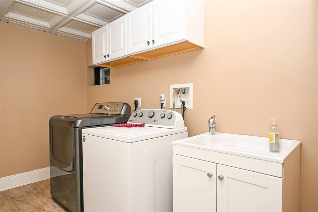 60 Harding Street, Unit C Medfield, MA 02052 - Photo 31 of 41 a utility room with dryer and washer