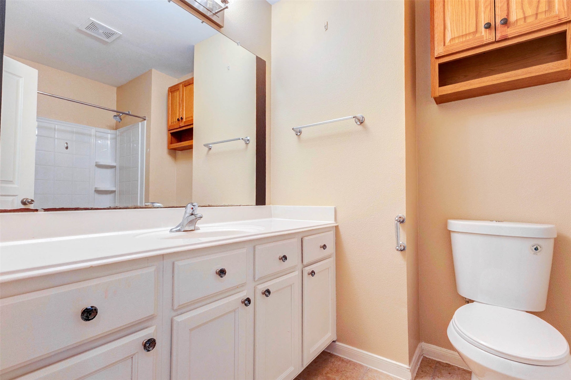 14522 Durham Chase Lane Houston, TX 77095 - Photo 22 of 40 a bathroom with a granite countertop toilet sink and mirror