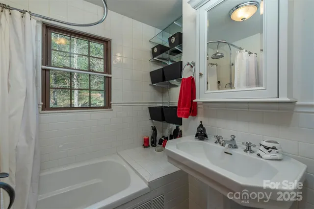 a bathroom with a sink and a bathtub