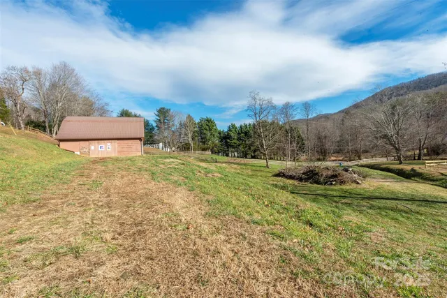 a view of a yard with an outdoor space