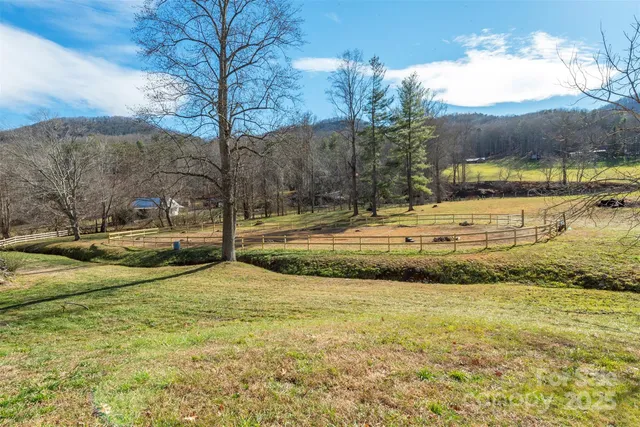 a view of a lake with a house