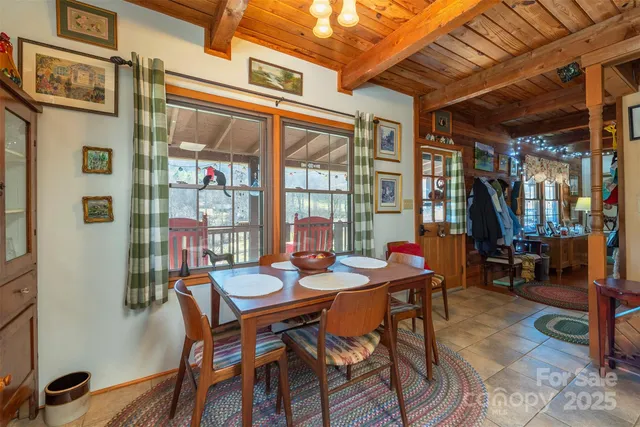 a view of a patio with a table and chairs