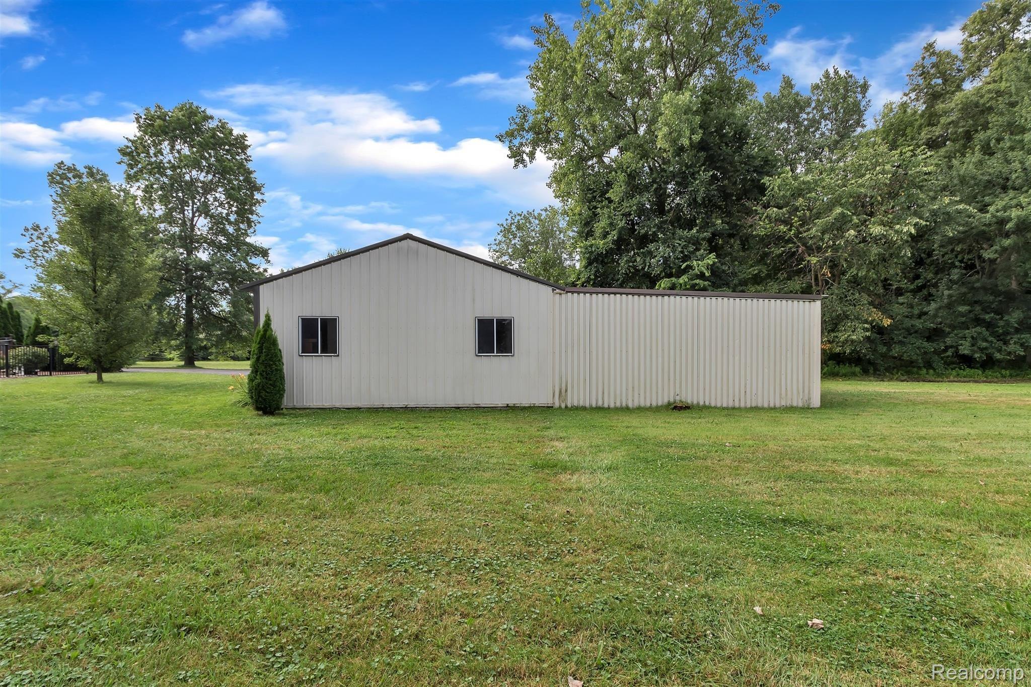 19450 Inkster Road Romulus, MI 48174 - Photo 14 of 60 BACKYARD/SIDE VIEW POLE BARN
