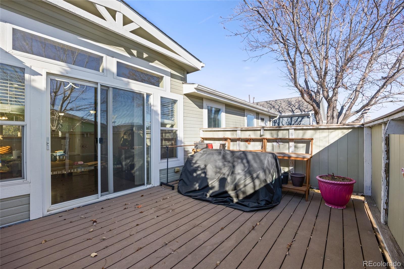 6160 Mallow Green, Unit 272 Frederick, CO 80530 - Photo 12 of 14 a view of a wooden deck with a patio