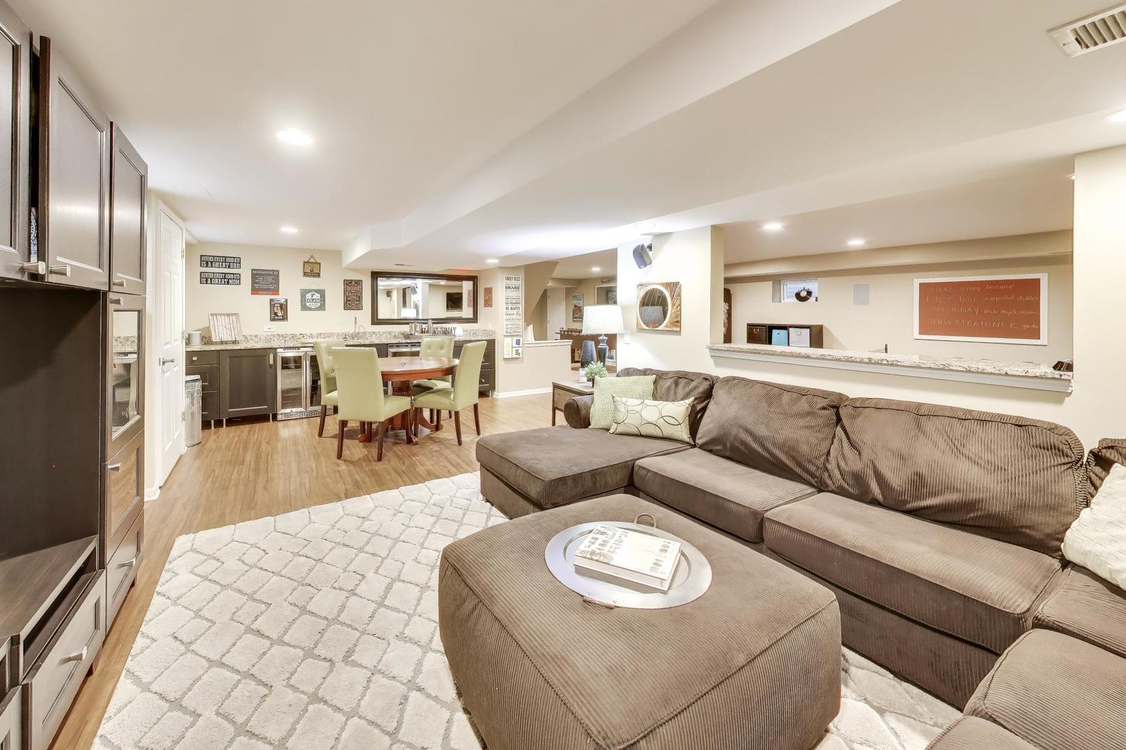3956 Rutgers Lane Northbrook, IL 60062 - Photo 31 of 41 a living room with furniture and a wooden floor