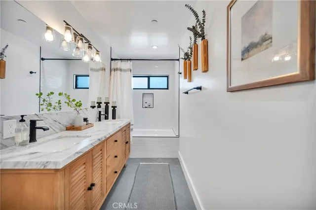 a view of a hallway with windows