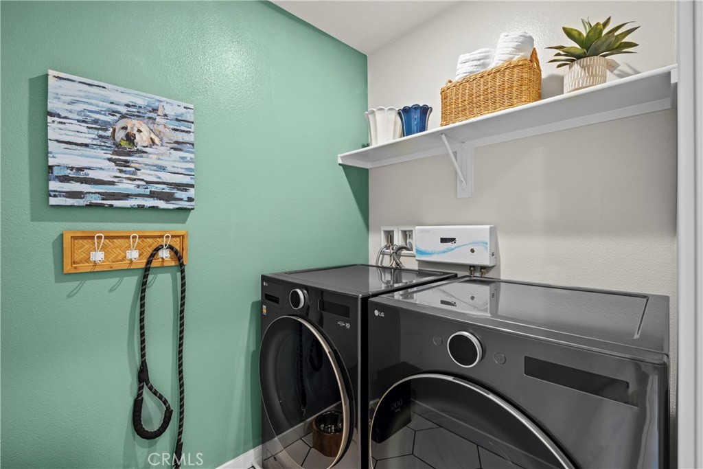 1936 West Sycamore Drive Compton, CA 90220 - Photo 14 of 19 a utility room with dryer and washer