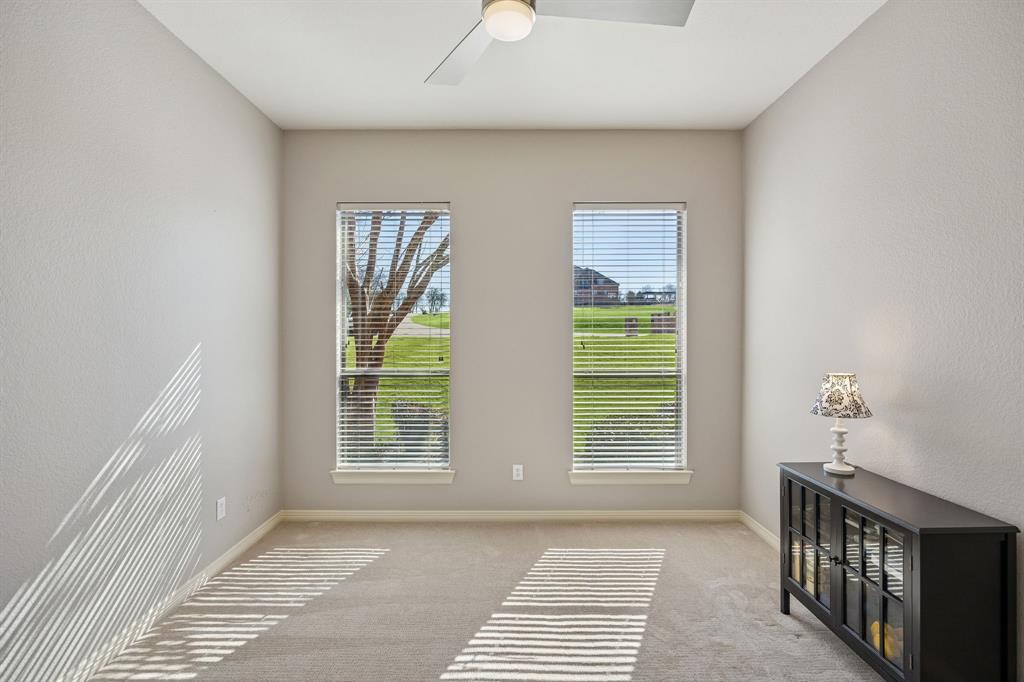 1520 Snider Court Lucas, TX 75002 - Photo 18 of 40 Secondary Bedroom on first floor of the home has a full size closet and an ensuite bathroom.