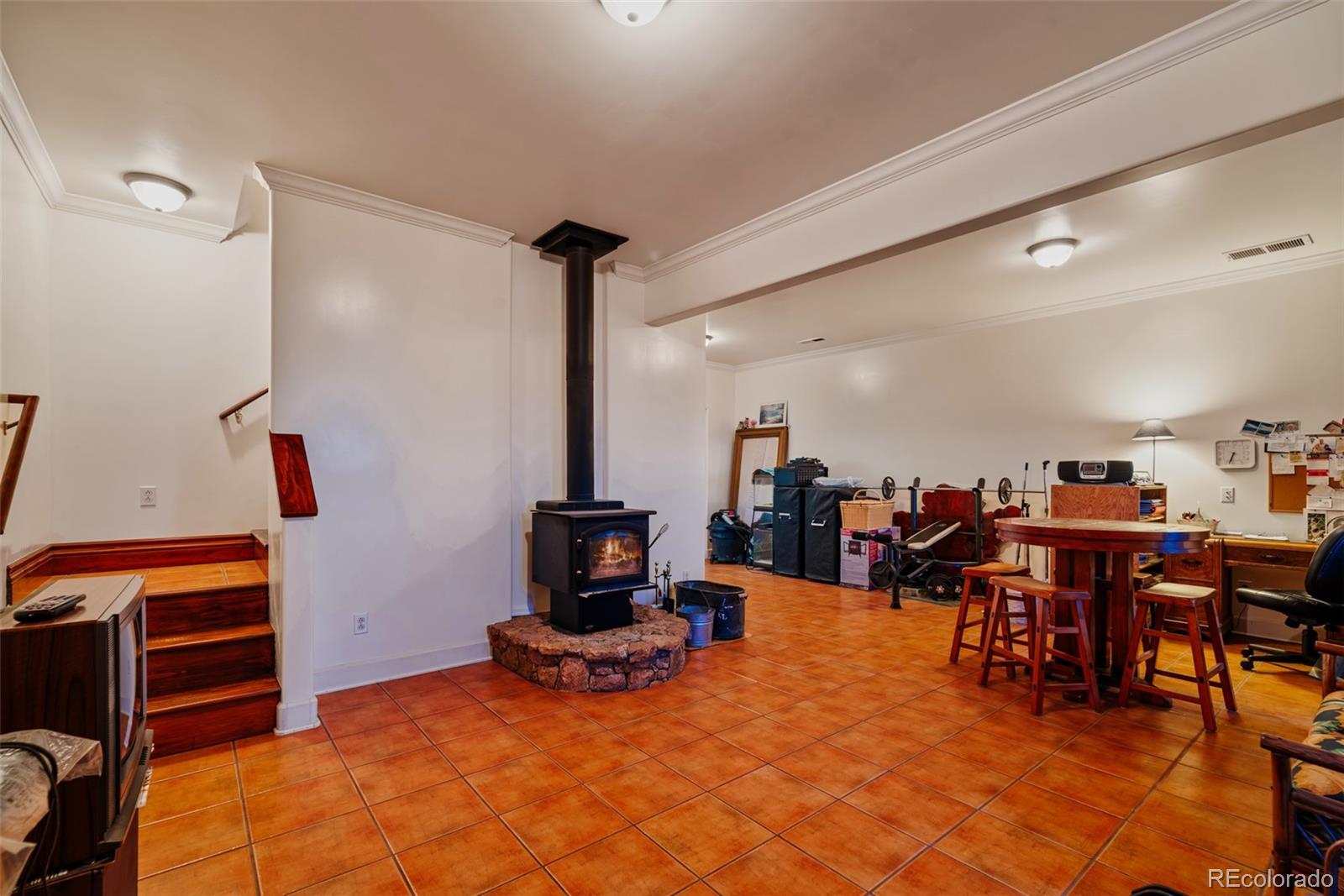 1023 Raven Way Como, CO 80432 - Photo 23 of 40 a view of a living room and dining room