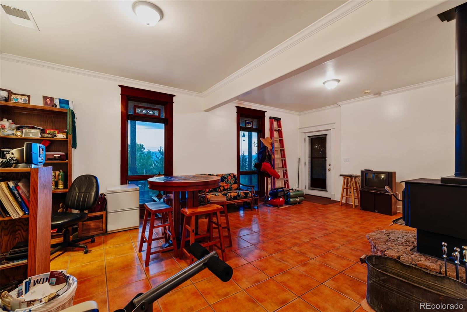 1023 Raven Way Como, CO 80432 - Photo 24 of 40 a view of a workspace with furniture