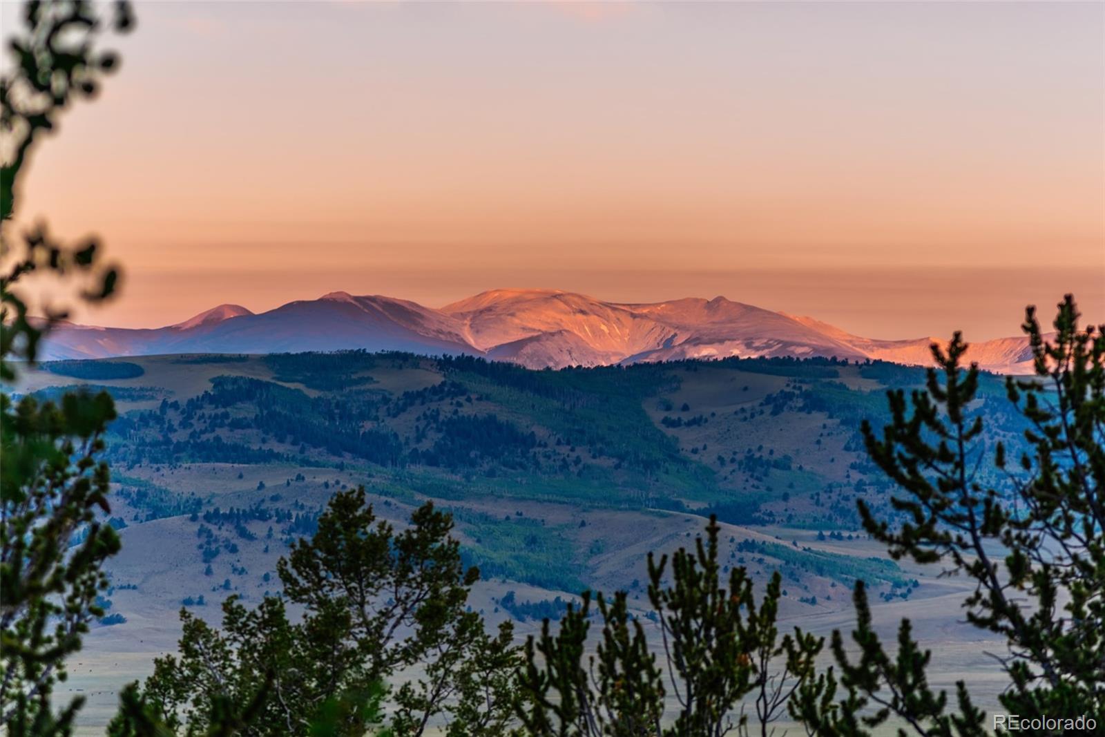 1023 Raven Way Como, CO 80432 - Photo 37 of 40 a view of a city with a mountain in the background
