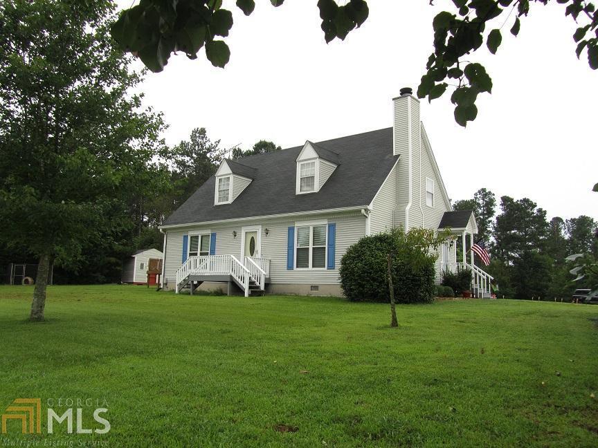 1822 Old Elbert Road Royston, GA 30662 - Photo 1 of 1 a front view of a house with garden