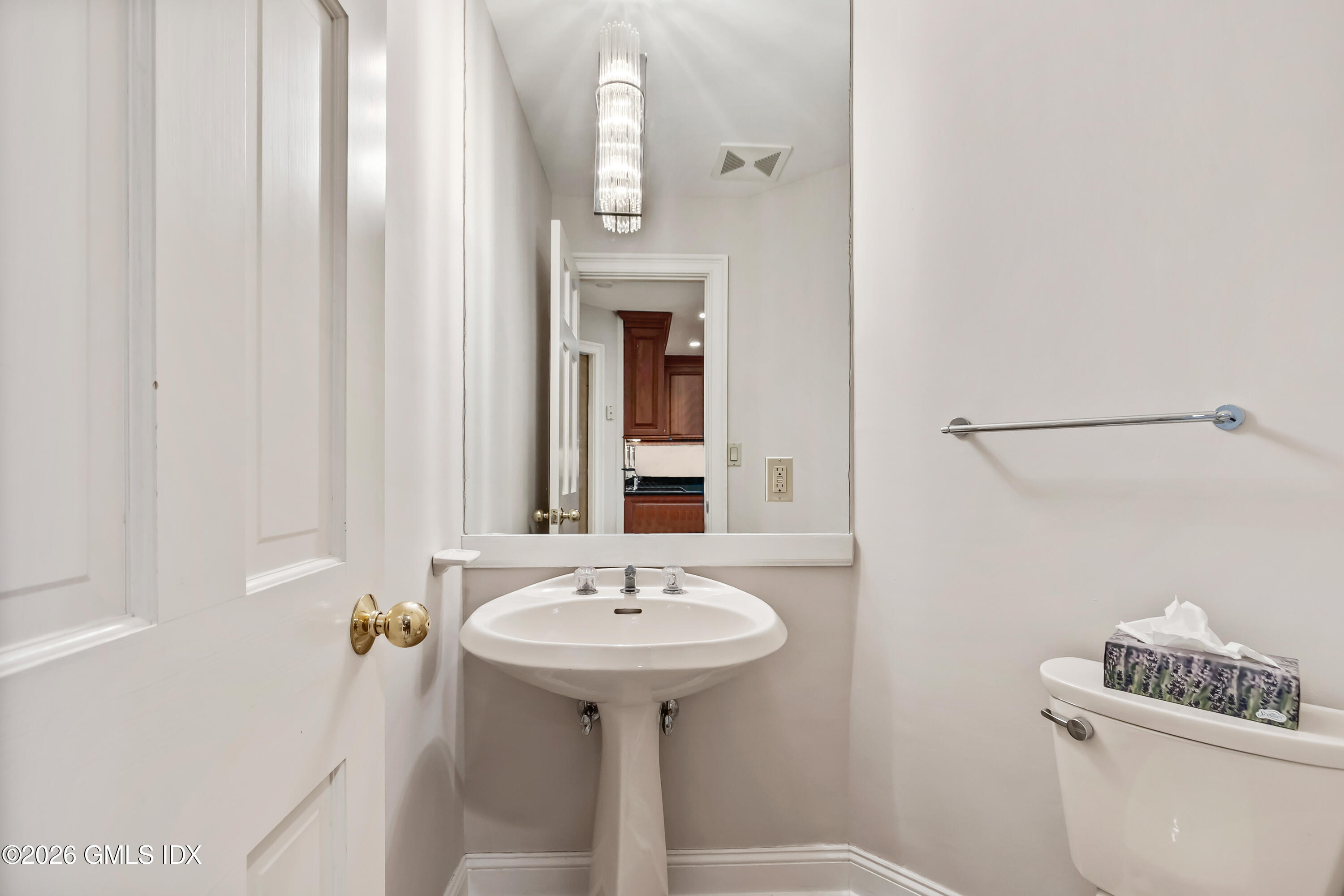 145 R Shore Road Old Greenwich, CT 06870 - Photo 12 of 41 a bathroom with a sink a toilet and shower