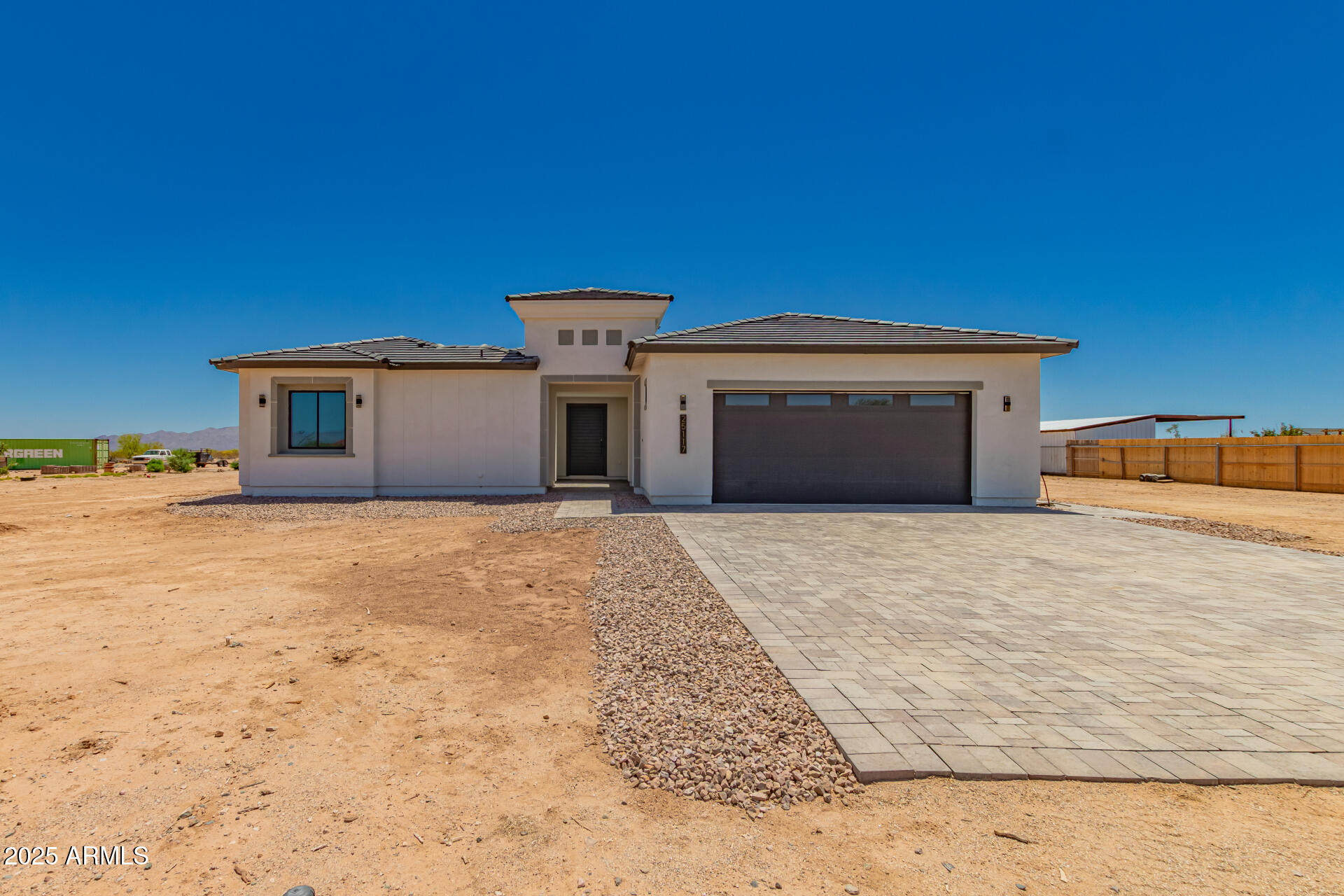 25117 West McArthur Road Wittmann, AZ 85361 - Photo 1 of 43 a view of a big room with a fireplace