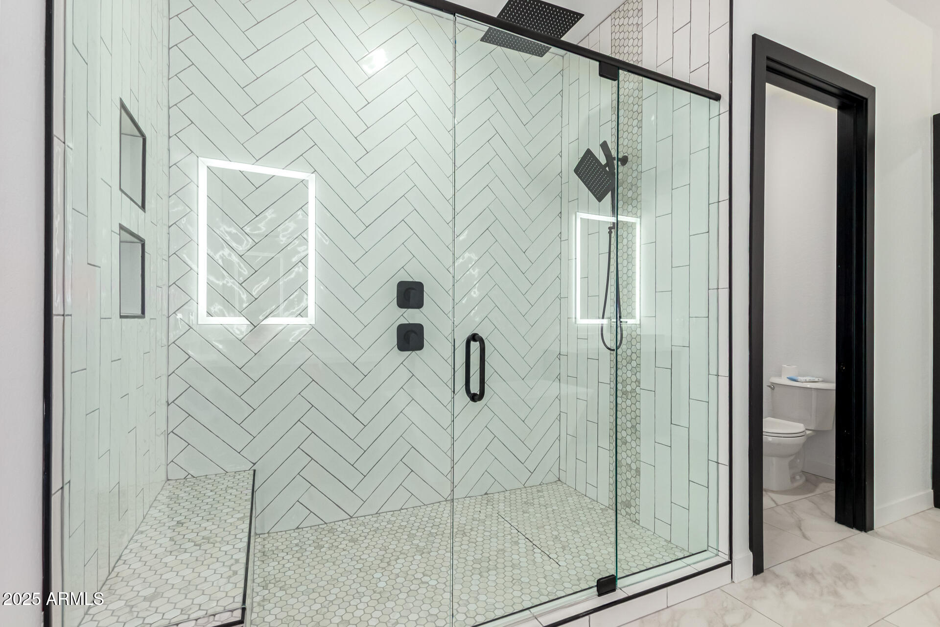 25117 West McArthur Road Wittmann, AZ 85361 - Photo 23 of 43 a bathroom with a shower