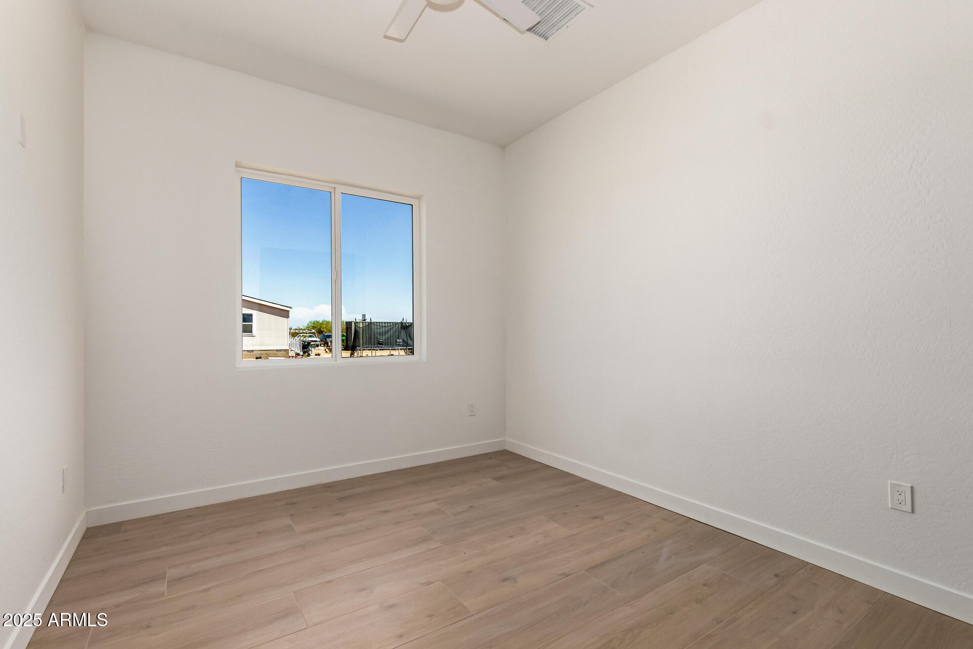 25117 West McArthur Road Wittmann, AZ 85361 - Photo 28 of 43 a view of an empty room