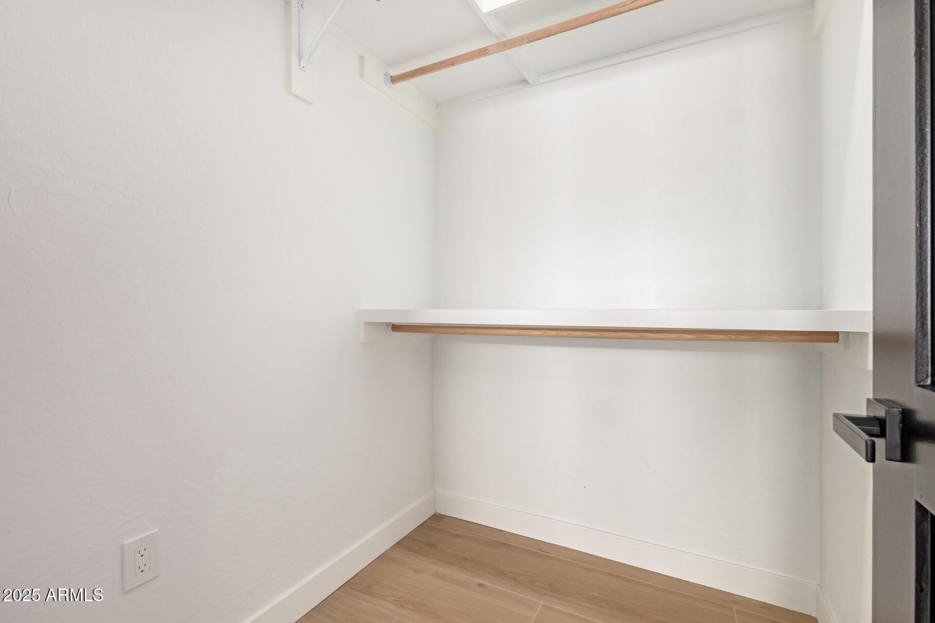 25117 West McArthur Road Wittmann, AZ 85361 - Photo 32 of 43 a close up view of racks on the wall