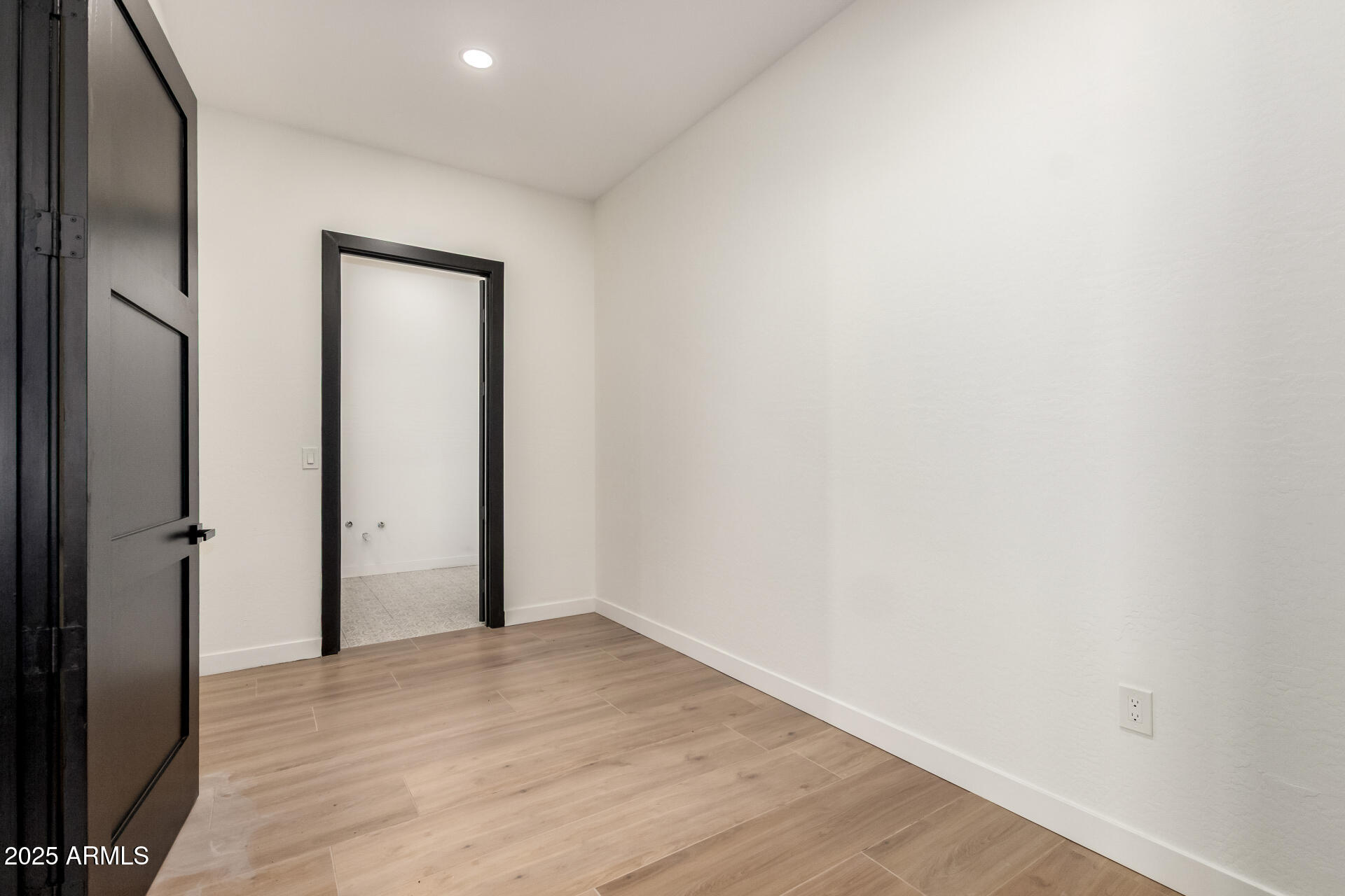 25117 West McArthur Road Wittmann, AZ 85361 - Photo 34 of 43 a view of hallway with wooden floor