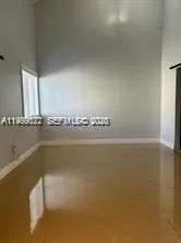 a view of a bathtub in a empty room