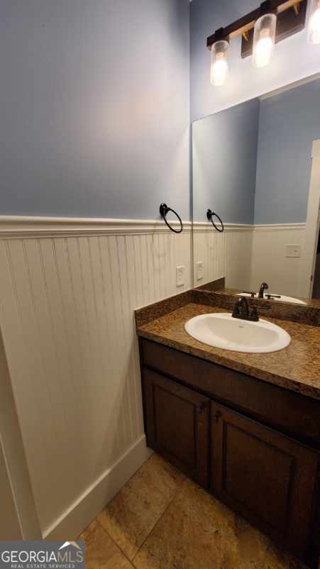 90 Alcovy Reserve Way Covington, GA 30014 - Photo 18 of 28 a bathroom with a sink and a mirror