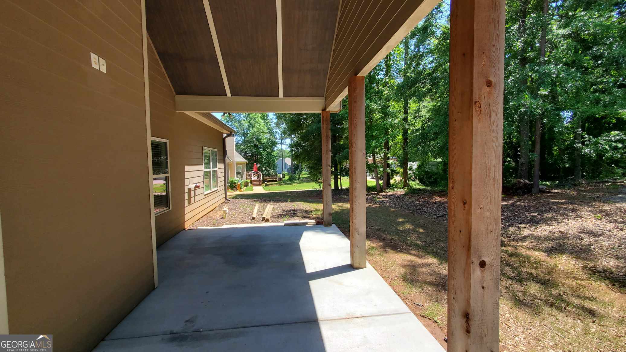 90 Alcovy Reserve Way Covington, GA 30014 - Photo 3 of 28 a view of a room with a floor to ceiling window and garden