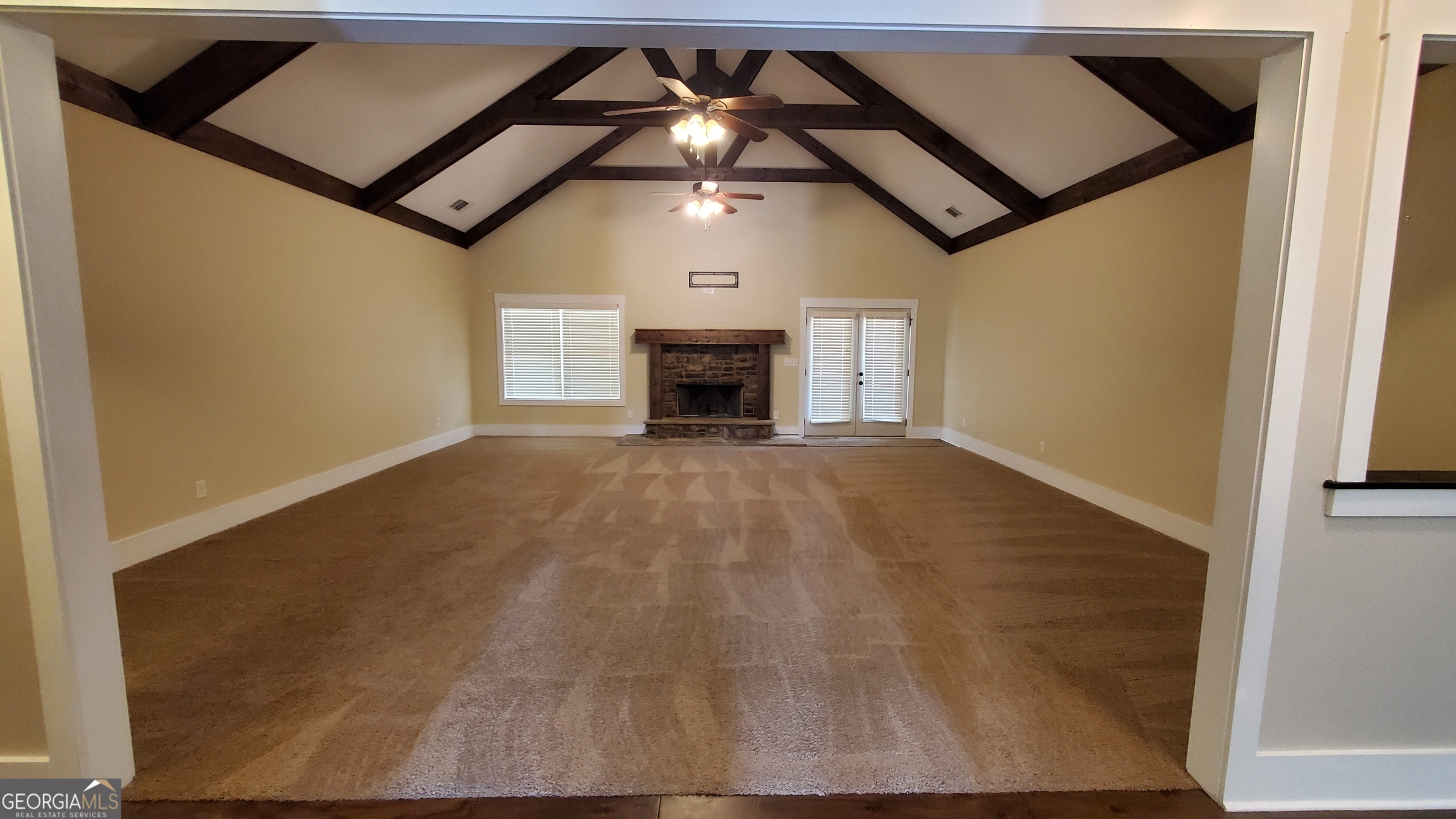 90 Alcovy Reserve Way Covington, GA 30014 - Photo 4 of 28 a view of empty room with a fireplace
