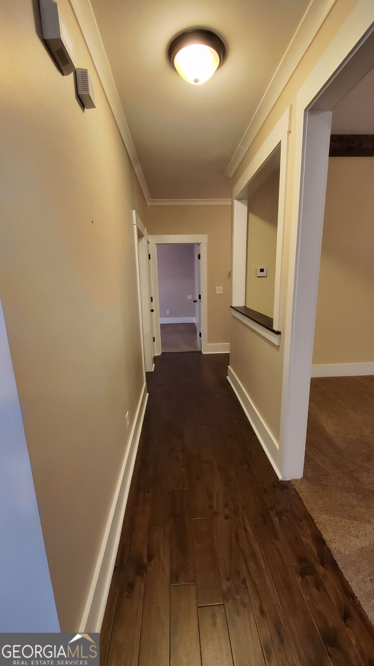 90 Alcovy Reserve Way Covington, GA 30014 - Photo 5 of 28 a view of a hallway with wooden floor