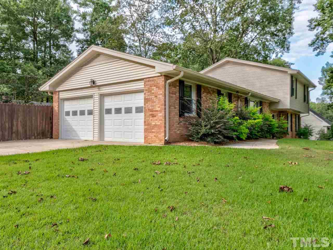 1016 Winona Road Raleigh, NC 27609 - Photo 24 of 25 a view of a house with backyard and garden