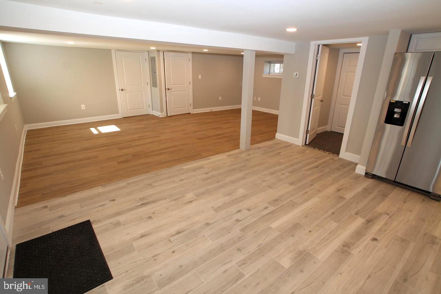 538 Durham Road Newtown, PA 18940 - Photo 3 of 11 a view of an empty room with wooden floor and a window