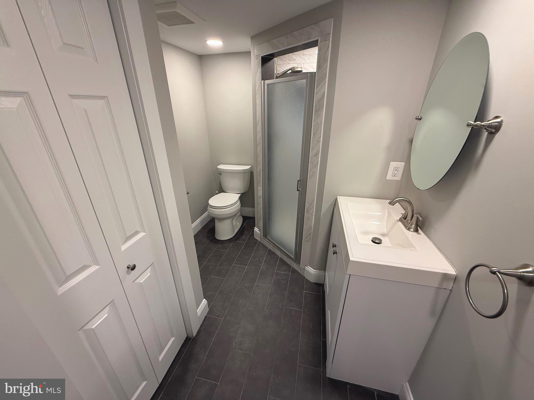 538 Durham Road Newtown, PA 18940 - Photo 10 of 11 a bathroom with a sink and mirror with toilet