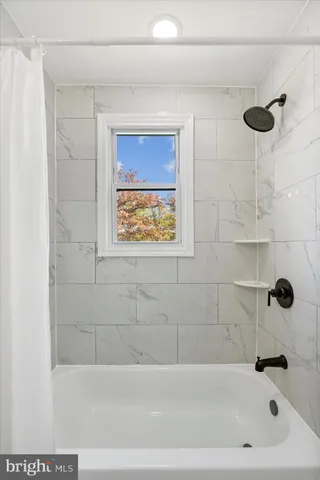 a bathroom with a bathtub