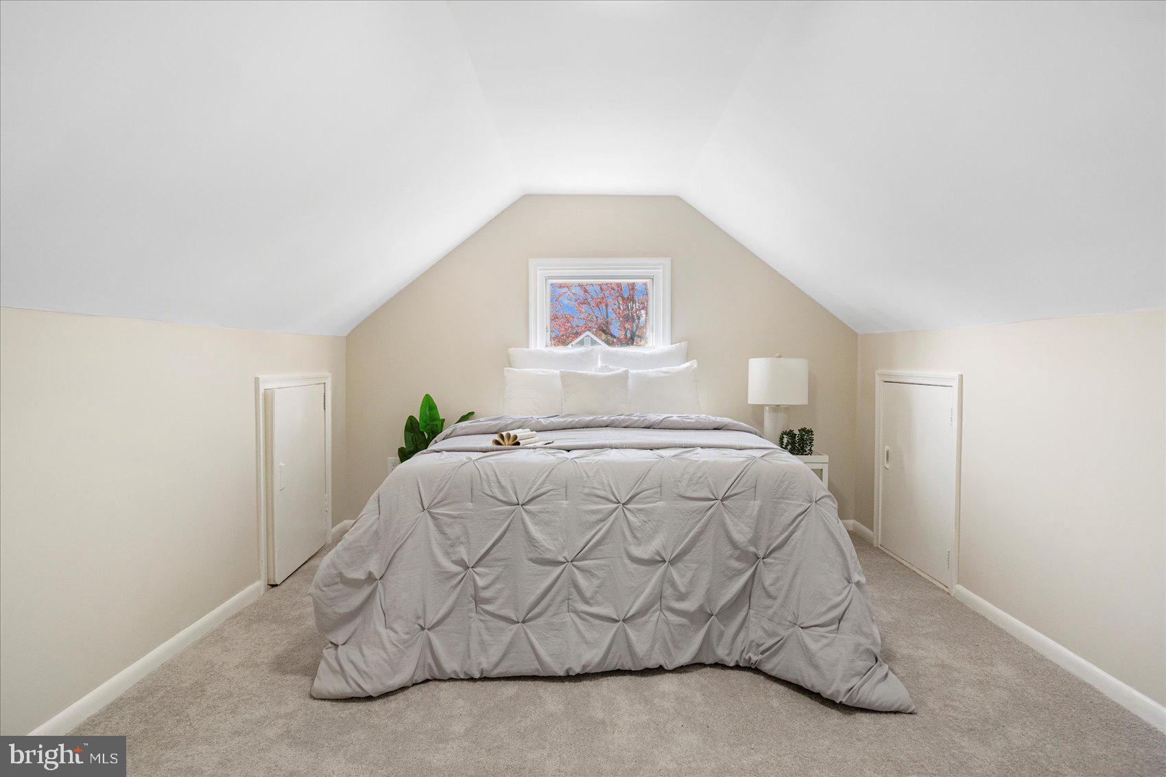 405 Margaret Avenue Baltimore, MD 21221 - Photo 24 of 38 a bedroom with a bed and a painting on the wall