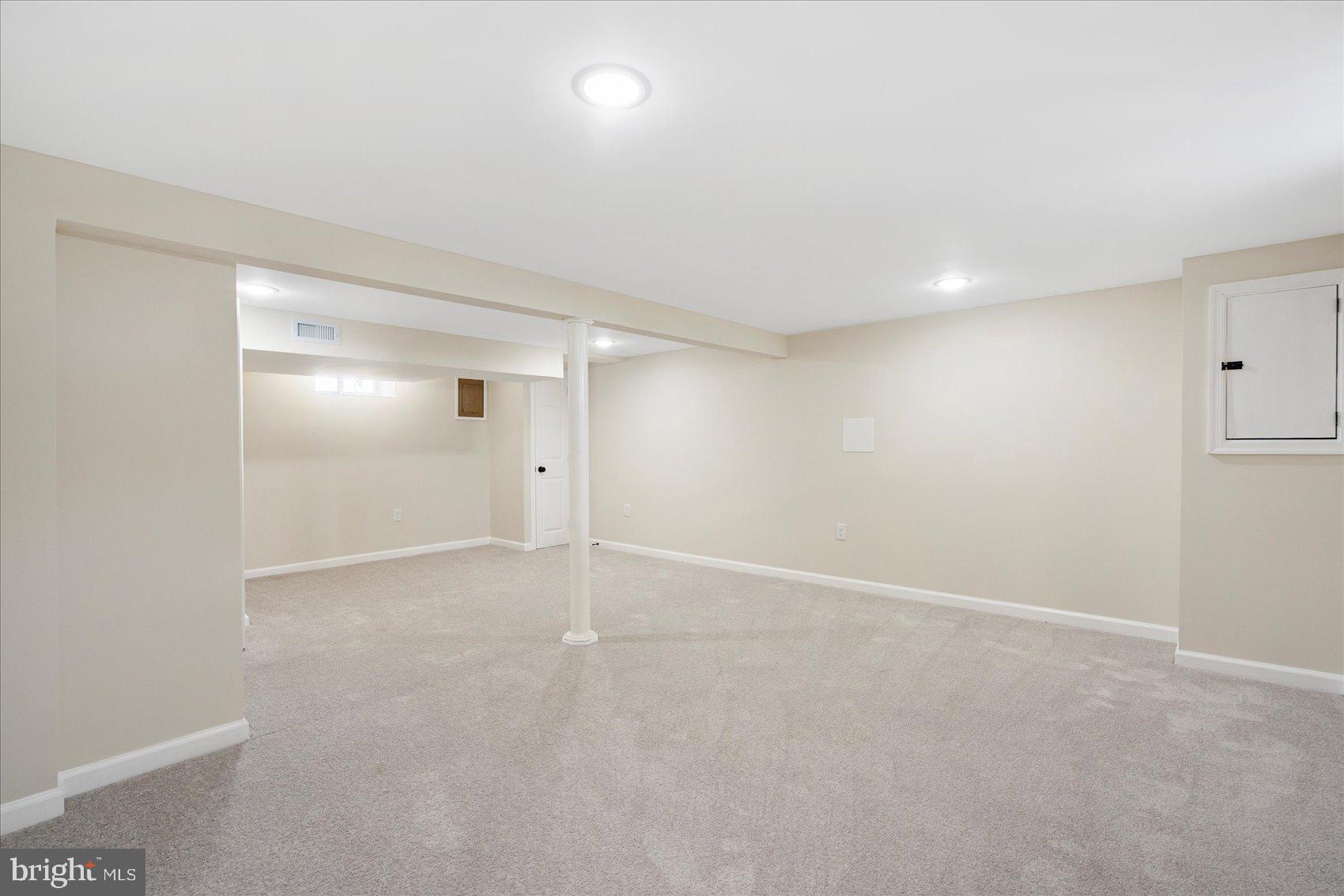 405 Margaret Avenue Baltimore, MD 21221 - Photo 28 of 38 an empty room with an entryway