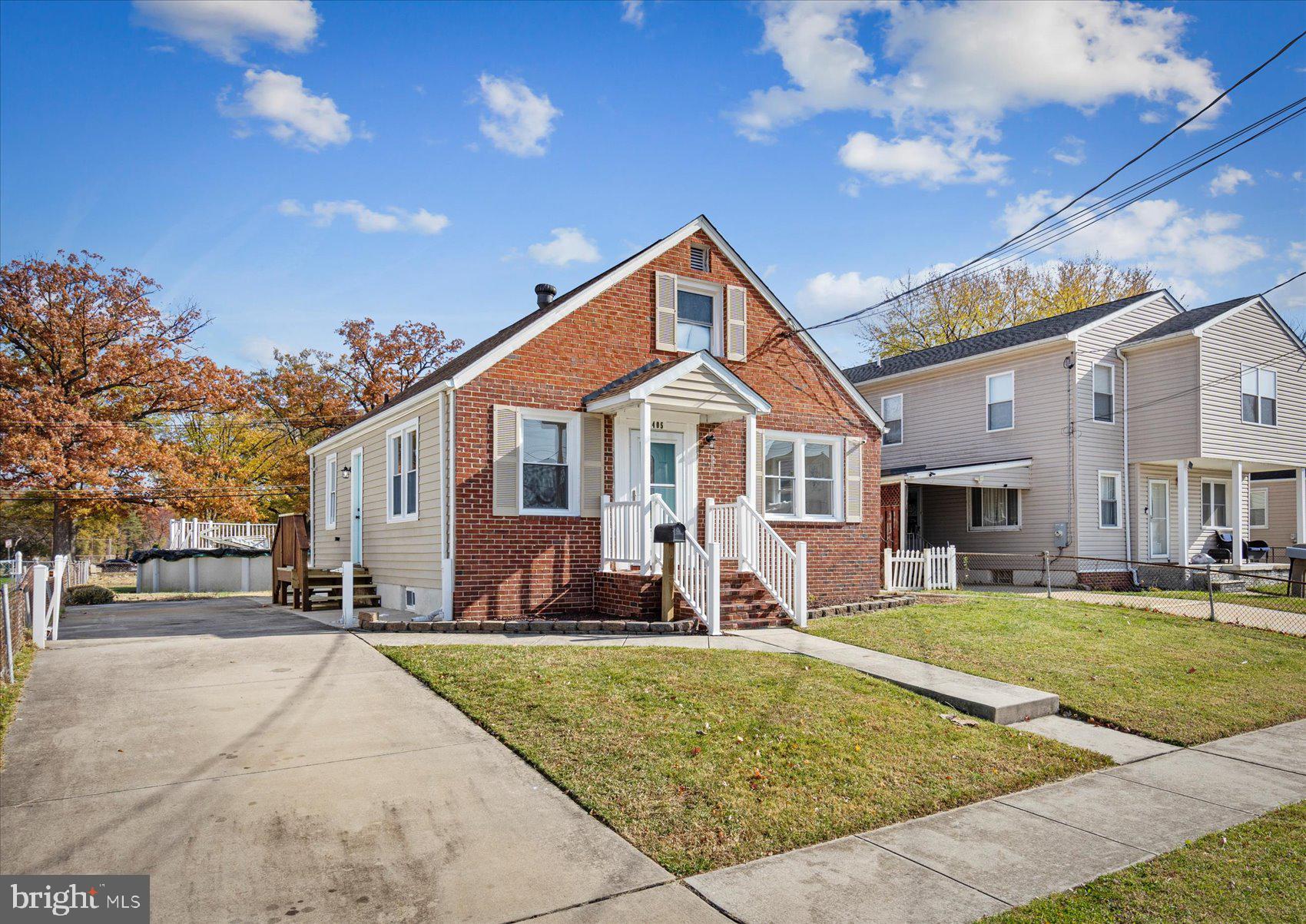 405 Margaret Avenue Baltimore, MD 21221 - Photo 34 of 38 a front view of a house with a yard