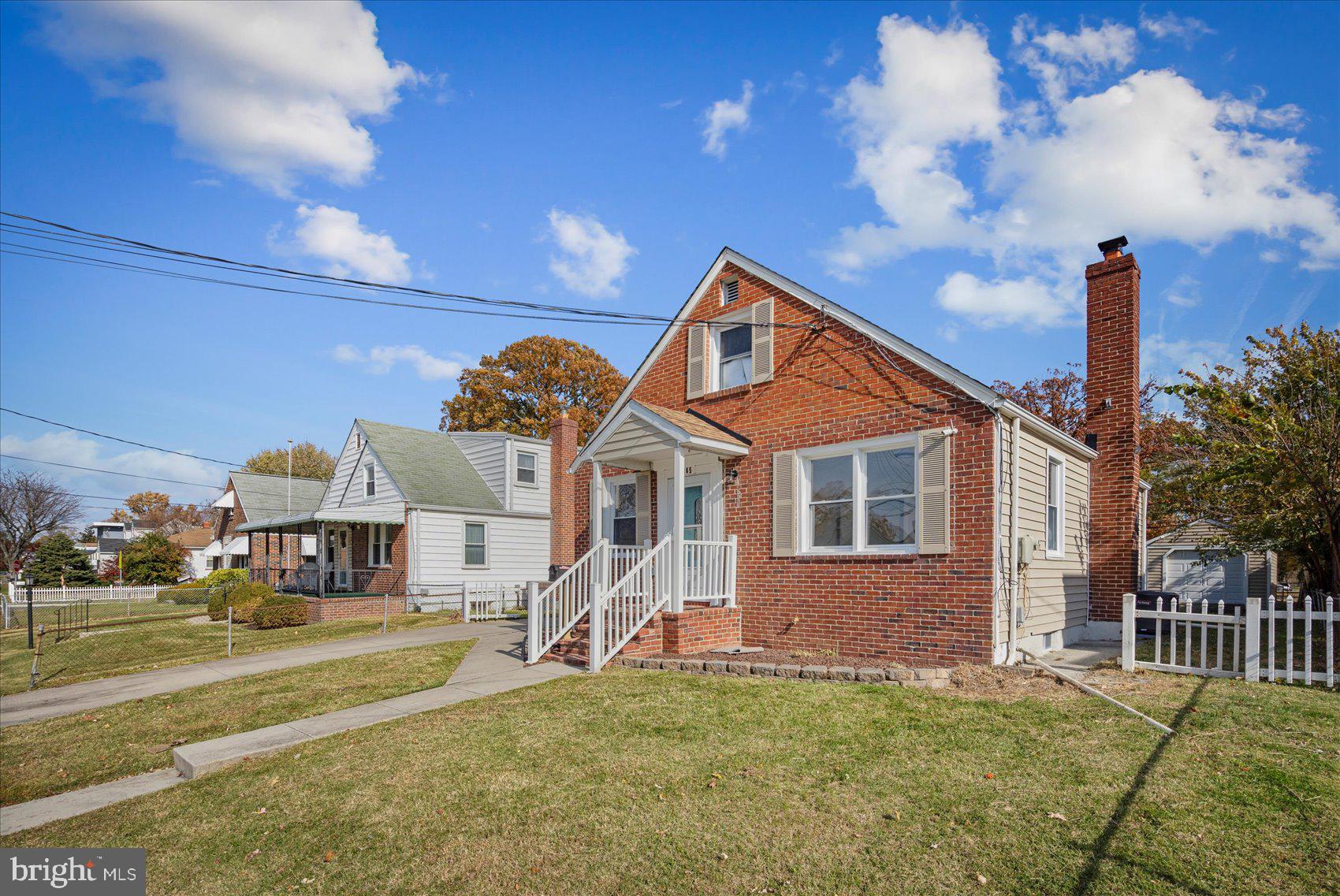 405 Margaret Avenue Baltimore, MD 21221 - Photo 35 of 38 a front view of a house with a yard